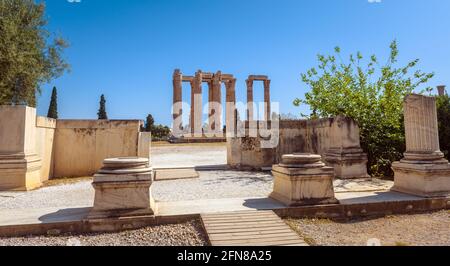 Zeus temple in Athens, Greece. Panorama of gateway of Ancient Greek monument, ruins of classical building. This place is famous tourist attraction of Stock Photo