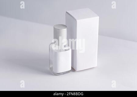 glass product package Perfume bottle and white gift box Stock Photo