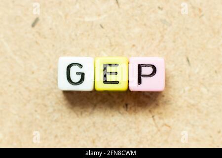 Color alphabet letter block in word GEP (abbreviation of good engineering practice) on wood background Stock Photo