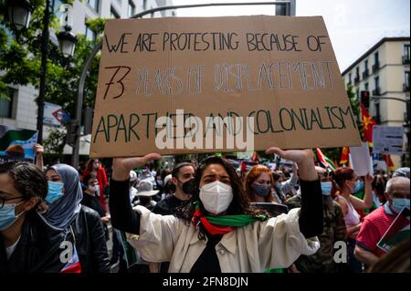 Madrid, Spain. 15th May, 2021. Protesters carrying placards during a demonstration against the last attacks by Israel to Palestinian people and coinciding with the 73rd anniversary of the 'Naqba'. Credit: Marcos del Mazo/Alamy Live News Stock Photo