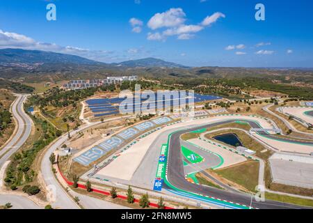 Portimao, Algarve, Portugal - May 2021 - Aerial drone view over racing track Algarve International Circuit in Lagos Portimao. First race turn. Stock Photo
