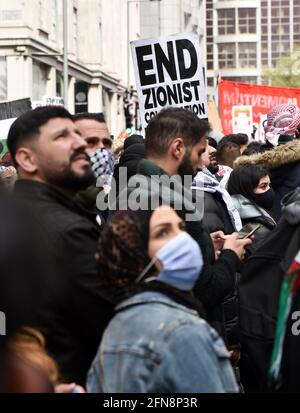 High Street Kensington, London, UK. 15th May 2021. Supporters of Palestine at the March for Palestine outside the Israel Embassy in London. Credit: Matthew Chattle/Alamy Live News Stock Photo