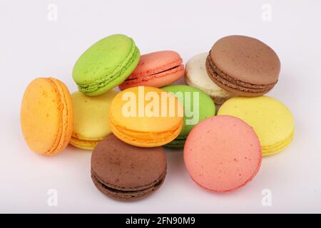 Colorful macarons isolated on white background. Stock Photo