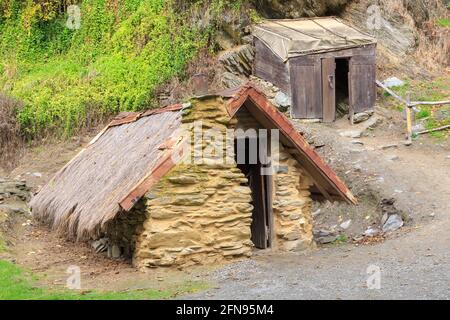 Old miners' huts at the Arrowtown Chinese Settlement, Arrowtown, New Zealand, dating back to a gold rush in the 1880s Stock Photo