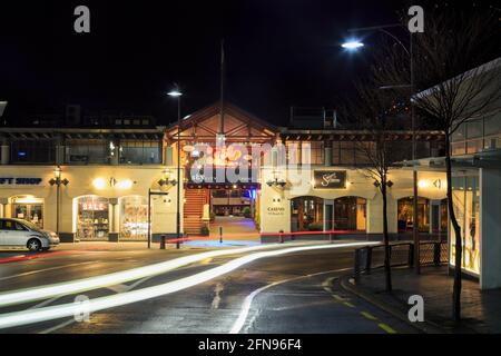 The Sky City Casino building on Steamer Wharf, Queenstown, New Zealand, at night Stock Photo