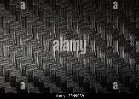 Black patterned textured background for design purpose. Ultra Glossy Carbon Fiber Vinyl Car Wrap Stock Photo