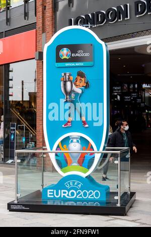 London, UK.  15 May 2021.  A sign outside the London Designer Outlet promotes UEFA's deferred Euro 2020 tournament which will be held in 2021, with some games taking place at Wembley Stadium. Credit: Stephen Chung / Alamy Live News