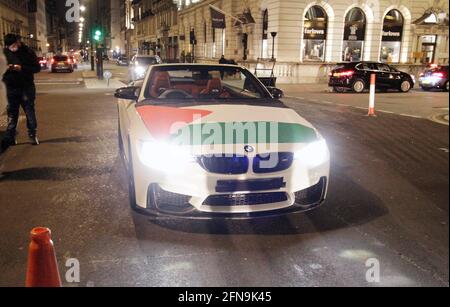 Palestinians with expensive cars went on a demo in London and they closed Trafalgar Square for a bit and also the pall mall were they closed the road and were making a lot of noice. The busses stopped running for about an hour and they were waiting at pall mall.The police came along and they did move with not making any problems but it was a bit strange to see all the expensive cars. 15/5/2021  1am blitz pictures Stock Photo