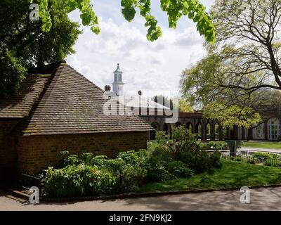 London, Greater London, England - May 11 2021: Water feature and garden arches at Holland Park on a sunny spring day. Stock Photo