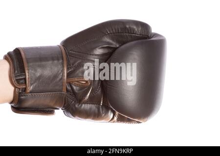 a man's hand in a brown boxing glove. isolated on white background. strike. martial arts. High quality photo Stock Photo