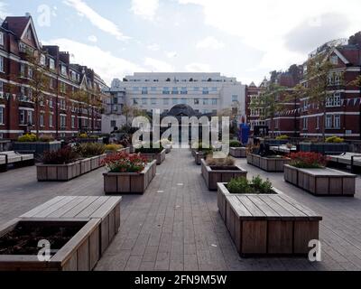 London, Greater London, England - May 11 2021: Brown Hart Gardens, a peaceful raised garden near Oxford Street. Stock Photo