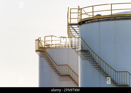 Stairs to go up to the fuel tanks, with a seagull's nest in one of them. Stock Photo
