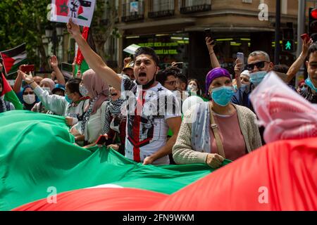Madrid, Spain. 15th May, 2021. Protesters chant slogans during a demonstration against the Israel attacks on the Palestinian people in Gaza. Credit: SOPA Images Limited/Alamy Live News Stock Photo