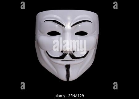 Anonymous mask isolated on black background. High quality photo Stock Photo