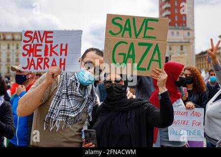 Turin, Italy. 15th May, 2021. Peaceful protesters hold banners 'Save Sheikh Jarrah' and 'Save Gaza' during a demonstration in solidarity with Palestine. Credit: MLBARIONA/Alamy Live News Stock Photo