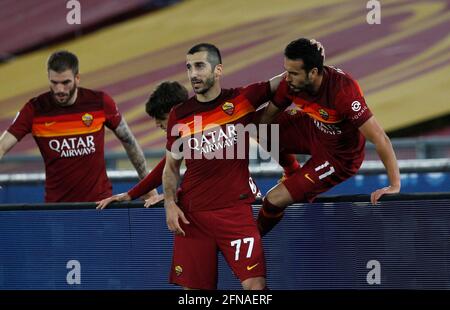 Rome, Italy. 15th May, 2021. Roma s Pedro, right, celebrates with his teammates after scoring during the Serie A soccer match between Roma and Lazio at the Olympic Stadium. Credit: Riccardo De Luca - Update Images/Alamy Live News Stock Photo