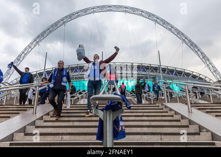 Wembley Stadium, Wembley Park, UK. 15th May, 2021. A discarded Chelsea flag hangs from the Olympic Steps as Leicester City fans celebrate their teams FA Cup Final victory against Chelsea at Wembley Stadium. It was the club's first FA Cup win in their 137-year history. They had reached four previous finals and lost them all. Credit: amanda rose/Alamy Live News Stock Photo