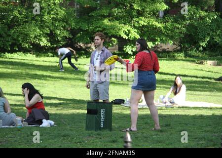 New York, USA. 15th May, 2021. (NEW) Crowded Central Park Amid Covid-19. May 15, 2021, New York, USA: Heavy movement of People at Central Park this sunny Saturday amid COVID-19. People are seen having fun, picnic, practicing sports and playing music on the Central Park lawn. Most of them arenÃ¢â‚¬â„¢t using masks or social distancing and as a result of the new USA CDC guidelines that now permit vaccinated people to be mask free indoor and in public places.Credit: Niyi Fote /Thenews2 Credit: Niyi Fote/TheNEWS2/ZUMA Wire/Alamy Live News Stock Photo
