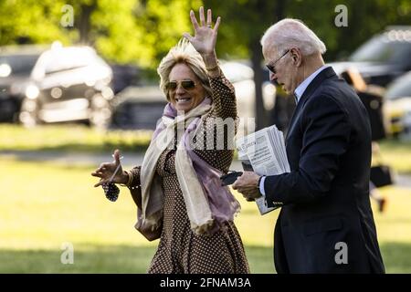Washington, United States. 15th May, 2021. First Lady Jill Biden waves as she walks with U.S. President Joe Biden to Marine One on the Ellipse near the White House in Washington, DC, U.S., on Saturday, May 15, 2021. Biden rescinded several executive actions on Friday that were put in place by Donald Trump, including one targeting social media companies that his predecessor had ordered after Twitter fact-checked his tweets. Photo by Samuel Corum/UPI Credit: UPI/Alamy Live News Stock Photo