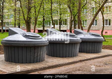 Large street trash cans in the park close up Stock Photo