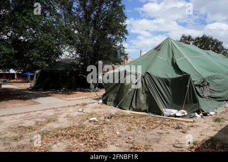 Laredo, United States. 15th May, 2021. Tents seen at the shelter.Holding Community Service provides shelter, food and Covid 19 testing upon arrival of migrant families to the centre. According to unofficial estimates approximately 200,000 migrants have crossed into the United States along the southern border since February 2021. (Photo by J Lamparski/SOPA Images/Sipa USA) Credit: Sipa USA/Alamy Live News Stock Photo