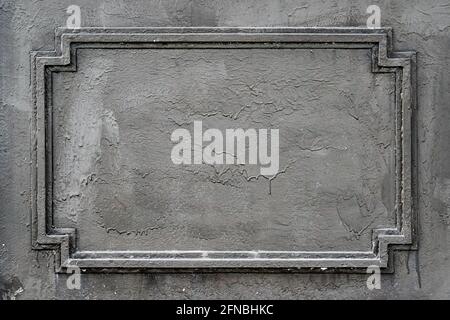 Dark grey metal blank frame to use as a signboard Stock Photo