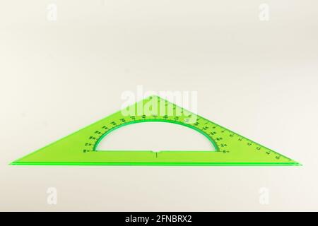 triangular ruler for studying at school isolated on a white background Stock Photo
