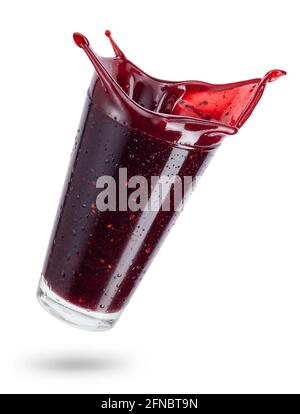 falling glass of berry smoothie isolated on white Stock Photo