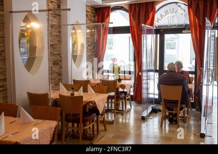 Echternach Luxembourg th May  A Couple Waits For Their Meal In A Restaurant In Echternach Luxembourg The Tables Are Separated From Each Other By Transparent Protective Walls In Luxembourg The Indoor - Restaurant Echternacher See