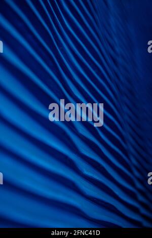 Decorative background blue color, striped texture upper and lower gradient. Wallpaper. Art. Design. Stock Photo