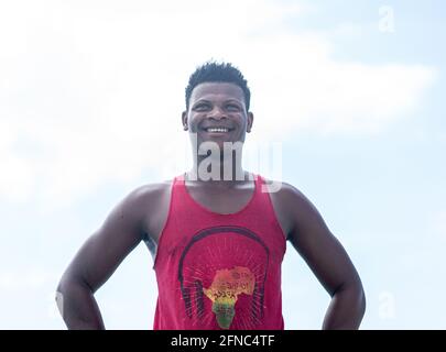 Young black man working on the coast Stock Photo
