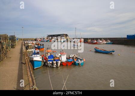 fishing boats moored in bridlington harbour on the yorkshire coast Stock Photo