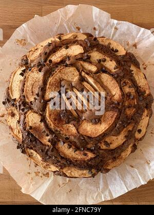 Homemade apple pie with chocolate and apple. Directly above. Stock Photo