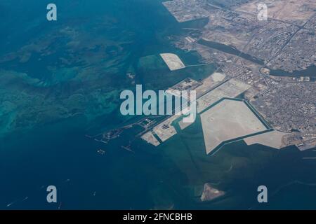 Manama – Bahrain - May 12, 2021: Aerial view showing the industrial coastal development of Al Sitra in Bahrain Stock Photo