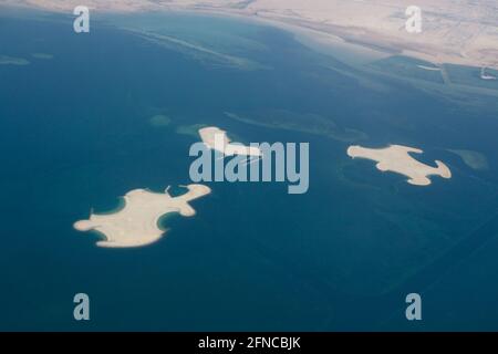 Doha – Qatar, May 12, 2021: Aerial view showing three artificial islands built for real estate development off the coast of Qatar Stock Photo