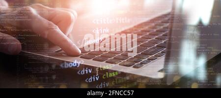 finger on laptop. internet technologies concept business front-end developing banner. mixed media Stock Photo