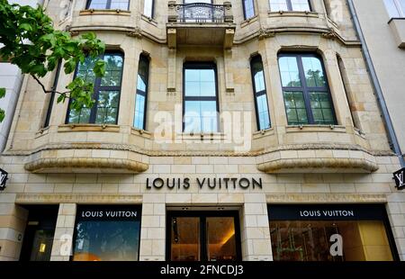 Exterior of the French luxury designer store Louis Vuitton on Königsallee in Düsseldorf. Königsallee is Düsseldorf's popular shopping boulevard.