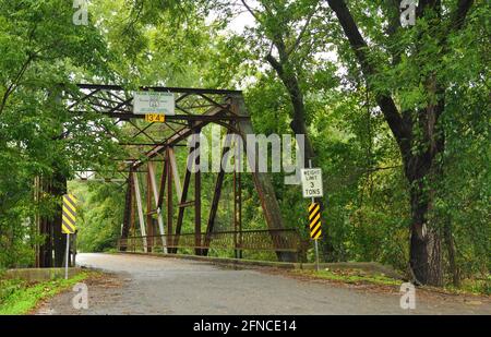 The historic Pryor Creek Bridge, built in 1926 in Chelsea, Oklahoma, carried Route 66 over the creek until 1932, when Route 66 was realigned. Stock Photo