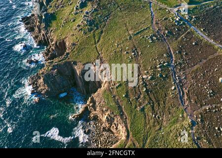 beautiful rugged coastline with cliffs and ocean, unique aerial coastal view taken at lands end Cornwall Stock Photo