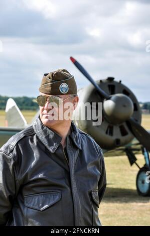 Male re-enactor with WWII US Army Airborne Infantry Parachute Cap Patch. Emblem. Wearing aviator style sunglasses Stock Photo