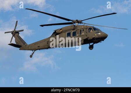 US Army Sikorsky UH-60 Black Hawk helicopter prepares to land at Naval Air Facility in Kanagawa. Stock Photo