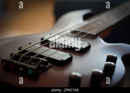 Closeup shot of a smooth body pickups bridge knobs and strings