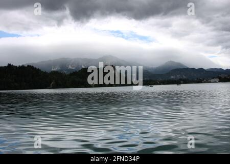 Dramatic Mountain Scenery whilst riding on Lake Bled, Slovenia Stock Photo