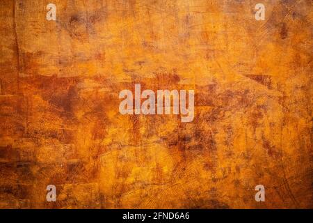 Brown orange Red texture from stucco ventiano. Textured stucco in bright terracotta. Stock Photo