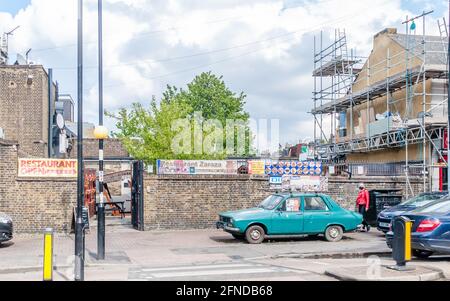 Restaurant Zaraze Forest Gate sign out side pavement and car Stock Photo