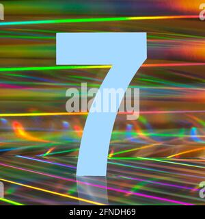 Number seven on abstract multicolored holographic background. Disco lights style. Stock Photo