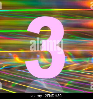 Number three on abstract multicolored holographic background. Disco lights style. Stock Photo
