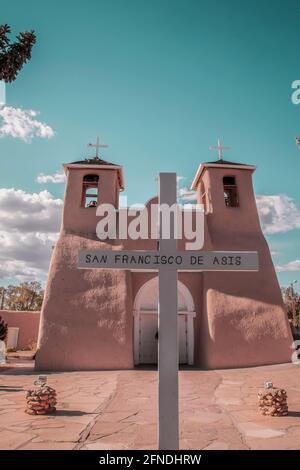 Vintage image of San Francisco de Asis historical church in Taos New Mexico USA - Pink and Turquoise toned Stock Photo