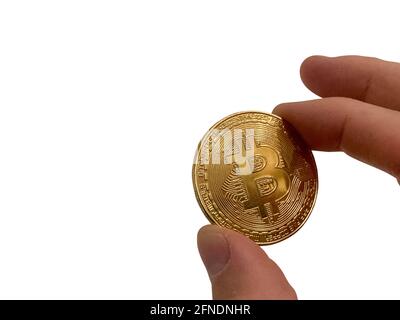Golden Bitcoin coin in man's hands isolated on white background Stock Photo
