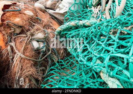 Mooring ropes and nets on a fishing boat. Accessories needed for fishing.  Spring season Stock Photo - Alamy